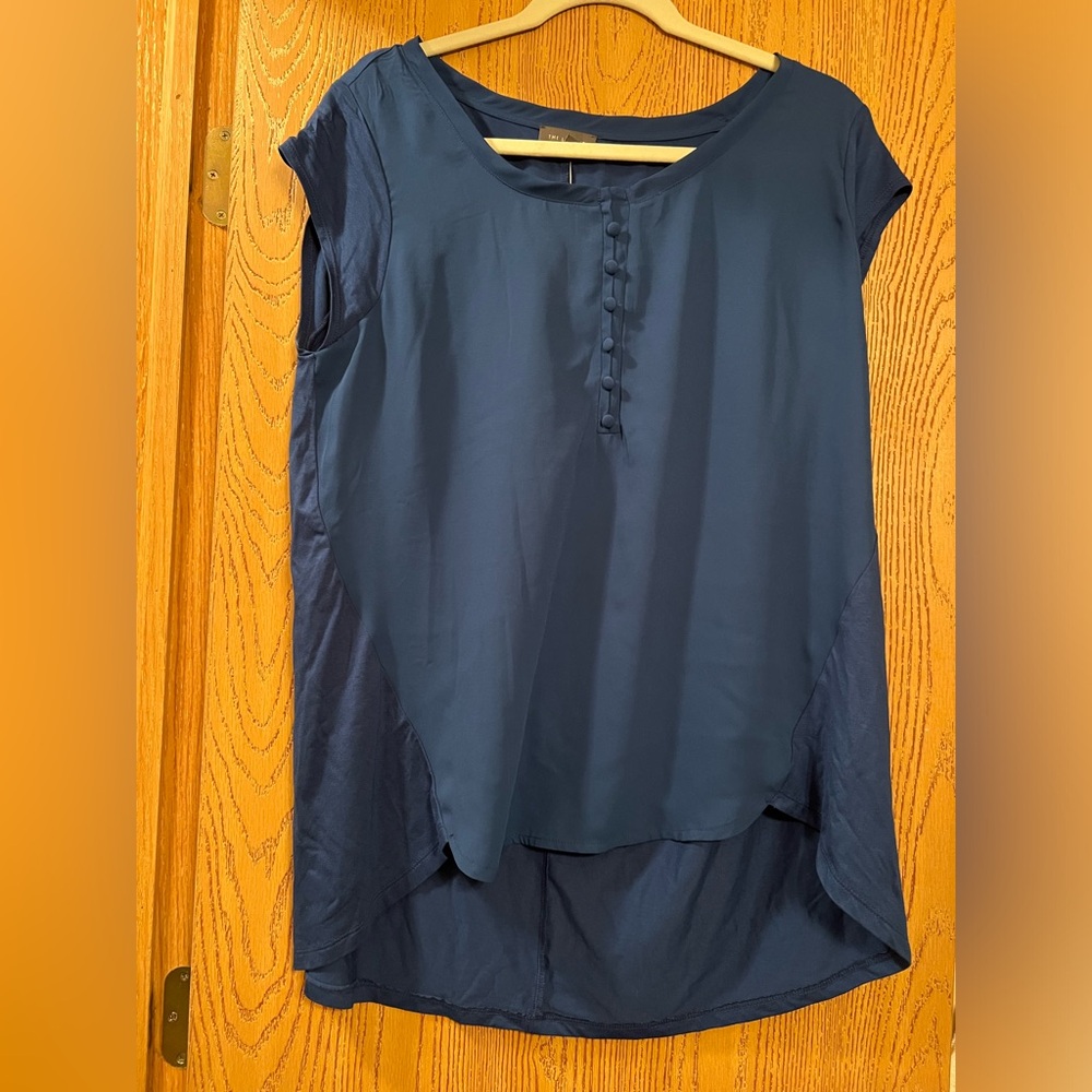 Bright blue XL shirt from The Limited. Fake button detail.